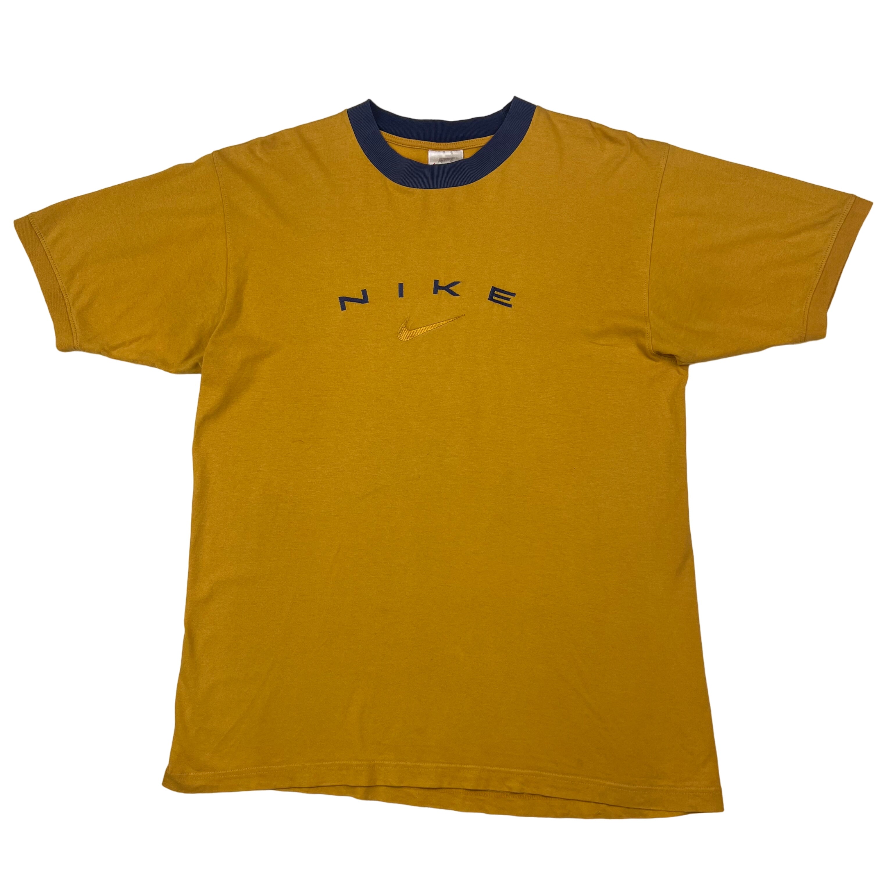 mustard yellow nike shirt